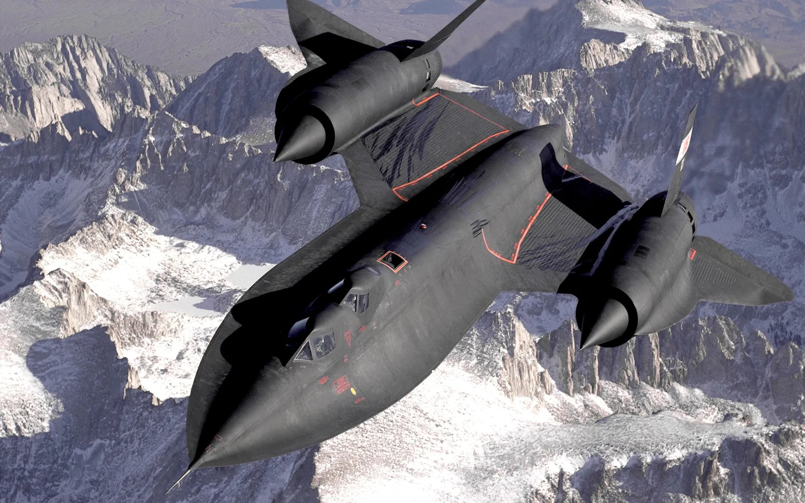 SR-71B trainer aircraft in flight over California's Sierra Nevada Mountains, representing advanced aerospace research and hypersonic flight technology